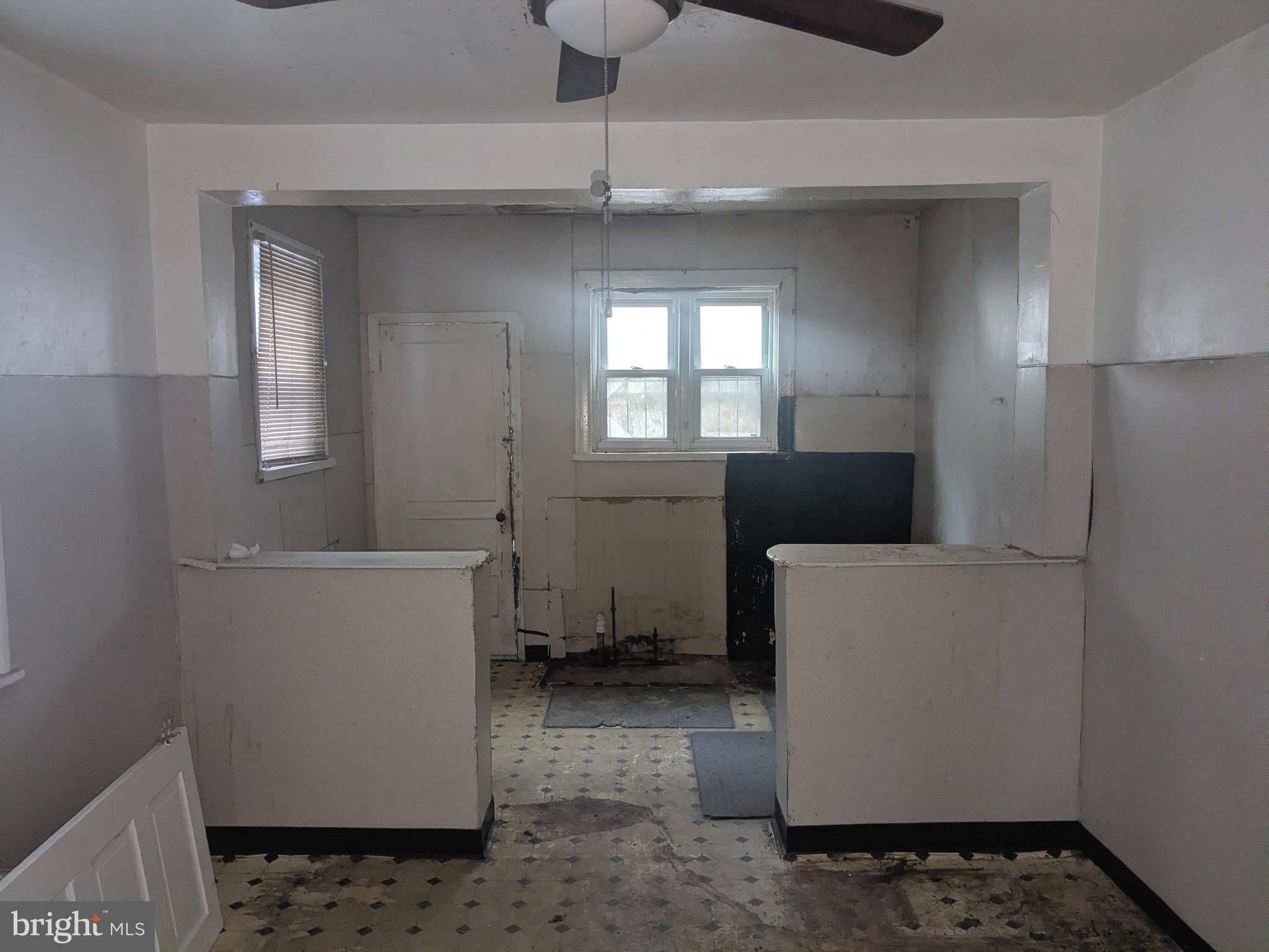 1619 Reed Street Philadelphia, PA 19146 - Photo 6 of 21 a room with a window a washer and dryer