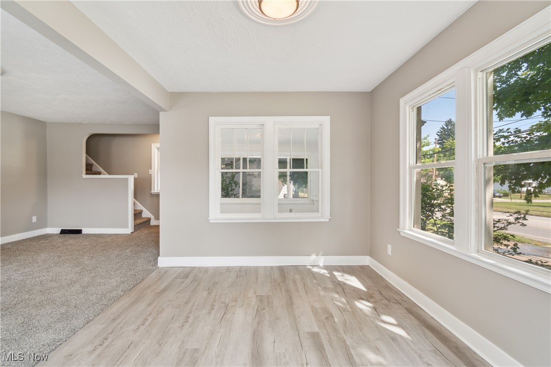 451 West Waterloo Road Akron, OH 44314 - Photo 6 of 27 Spare room featuring light hardwood / wood-style flooring