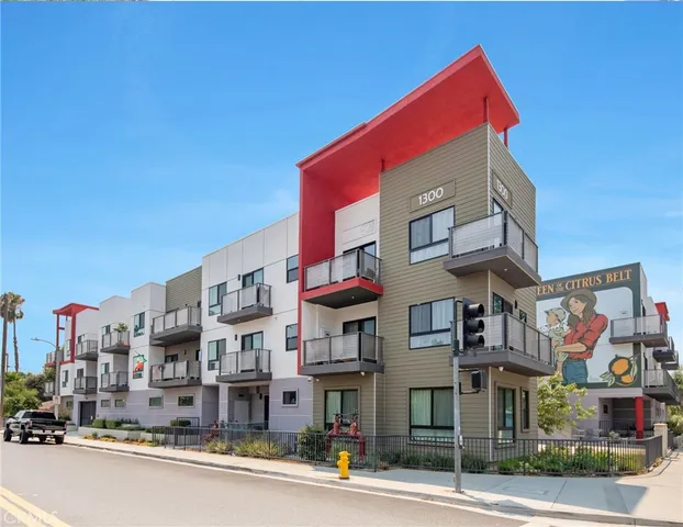a view of parking garage with cars