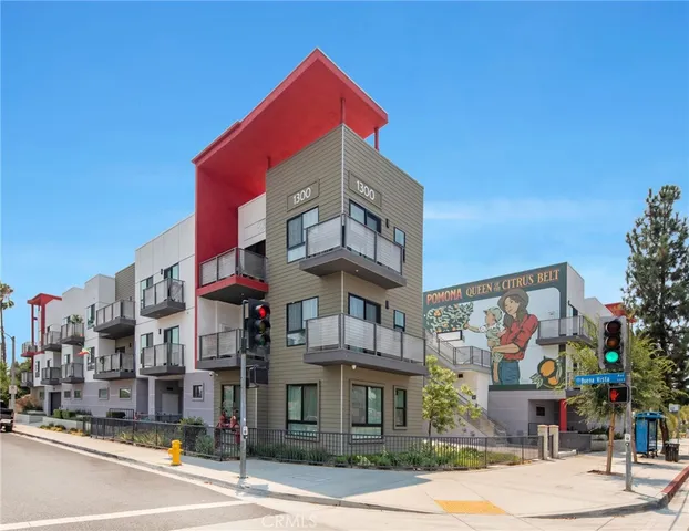 a view of parking garage with cars