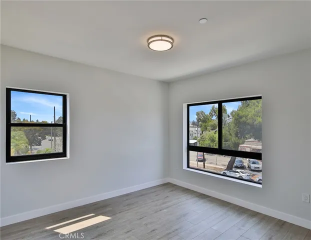 a couple of chairs in front of a house