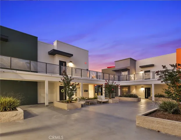 a view of a building with a street