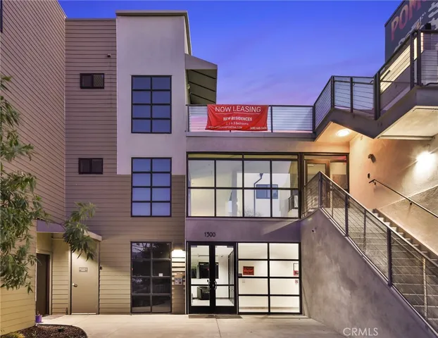 a view of a building with a street