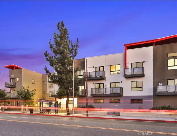 a view of a city with tall buildings