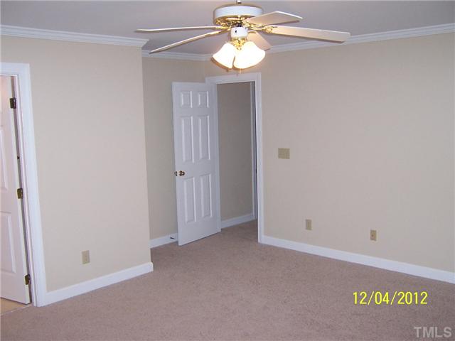 7709 Lambroll Lane Raleigh, NC 27613 - Photo 16 of 18 a view of an empty room