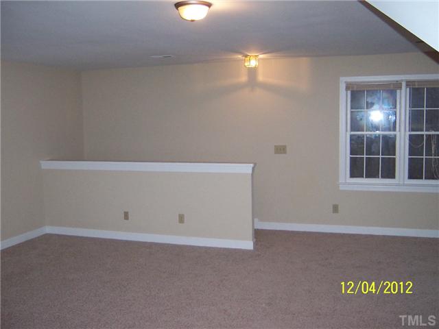 7709 Lambroll Lane Raleigh, NC 27613 - Photo 18 of 18 a view of an empty room