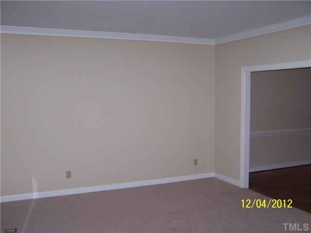 7709 Lambroll Lane Raleigh, NC 27613 - Photo 4 of 18 a room