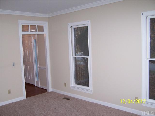 7709 Lambroll Lane Raleigh, NC 27613 - Photo 5 of 18 a view of an front door