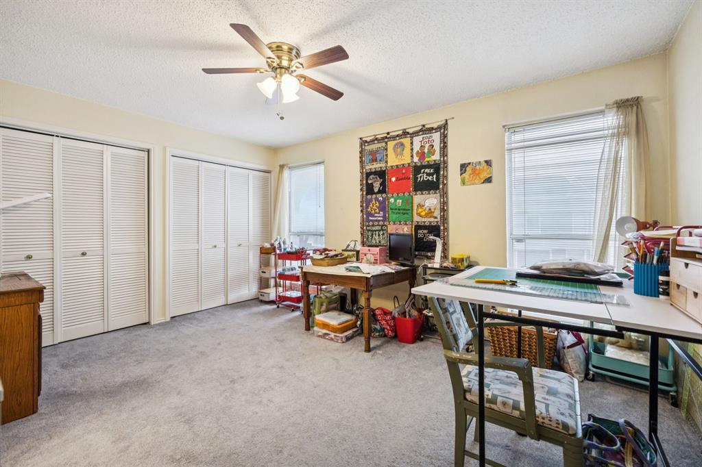 9222 Church Road, Unit 108 Dallas, TX 75231 - Photo 22 of 27 a view of a workspace with furniture and a window