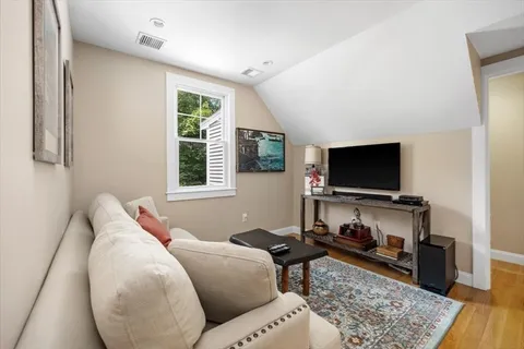 a view of a livingroom with furniture and windows