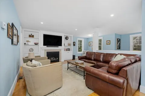 a view of a dining room with furniture and window