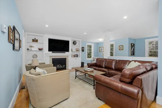 a view of a dining room with furniture and window