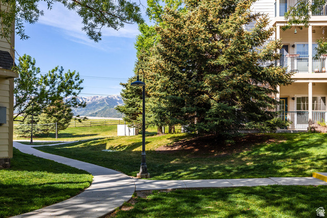 Surrounding community featuring a mountain view