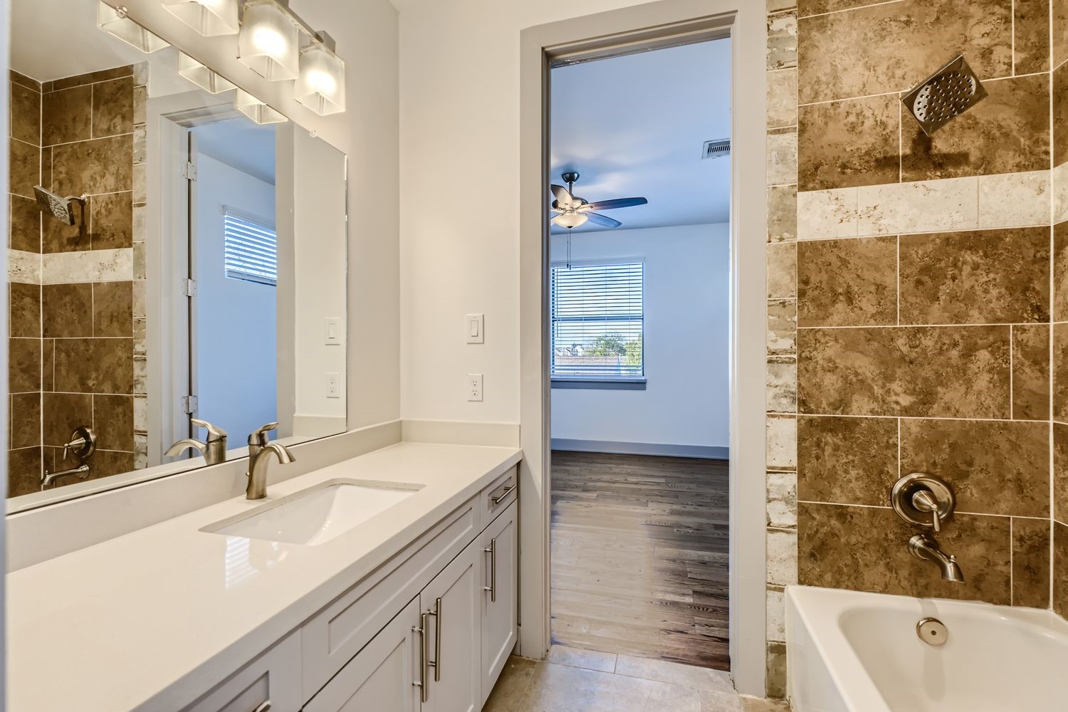 2208 Arabelle Street Houston, TX 77007 - Photo 17 of 26 a bathroom with a sink and a mirror