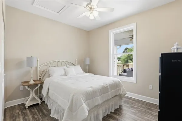 a view of balcony with couch and wooden floor