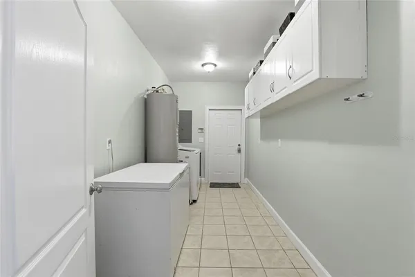 a view of a house with wooden deck