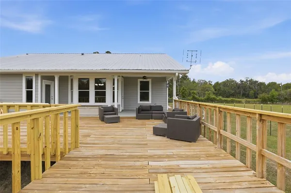 a view of a backyard of the house
