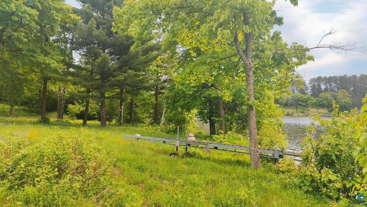4839 Ambassador Point Court Orr, MN 55771 - Photo 15 of 15 View of yard with a water view and a forest view