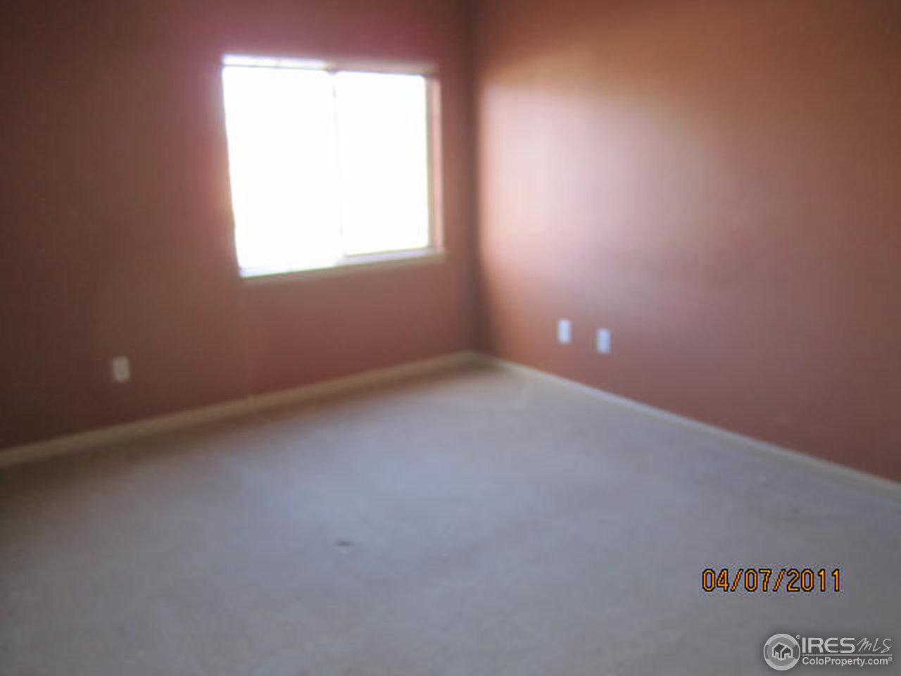 6607 West 3rd Street, Unit 1202 Greeley, CO 80634 - Photo 11 of 14 an empty room with a window