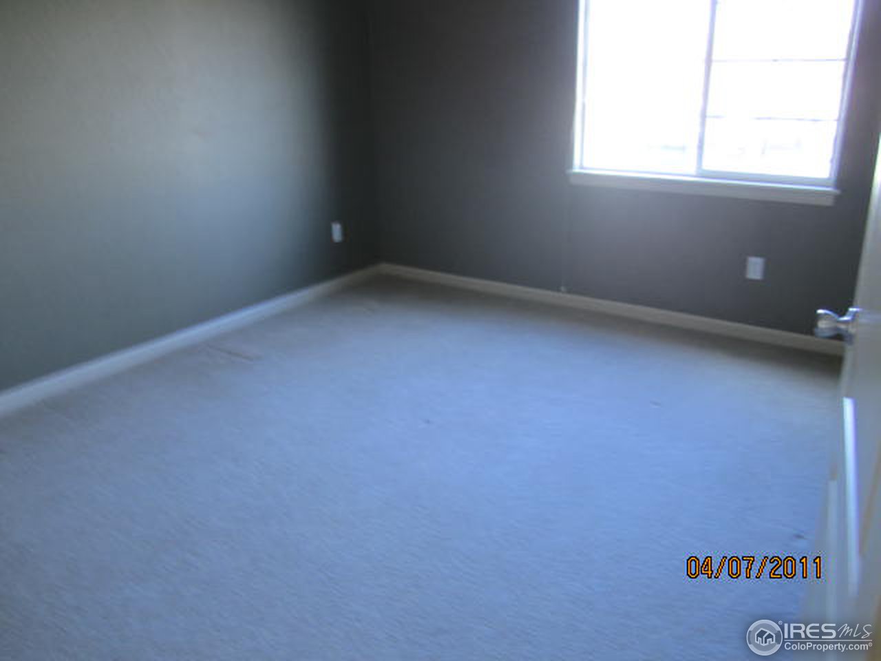6607 West 3rd Street, Unit 1202 Greeley, CO 80634 - Photo 8 of 14 an empty room with a window