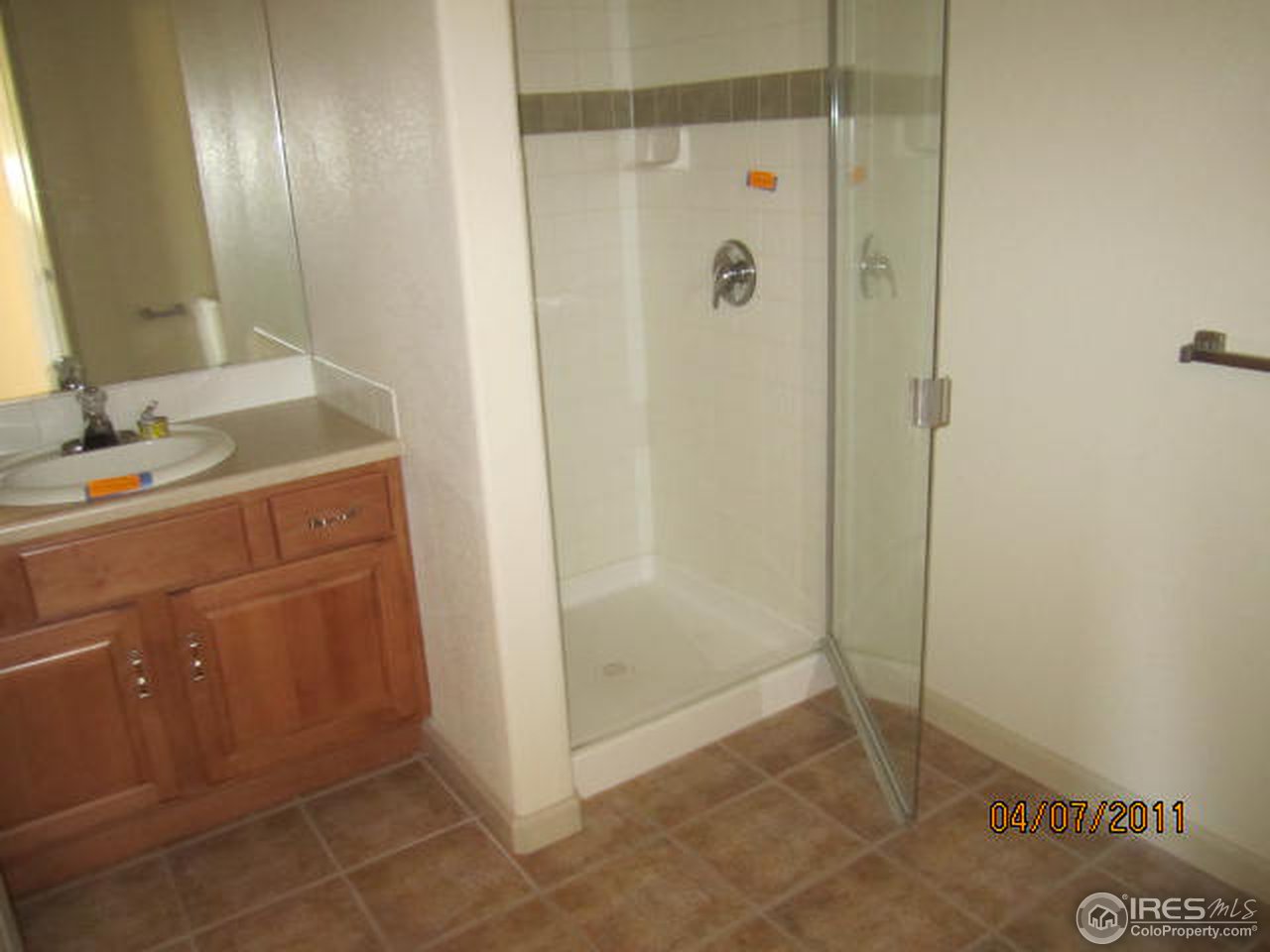 6607 West 3rd Street, Unit 1202 Greeley, CO 80634 - Photo 10 of 14 a bathroom with a shower and a sink