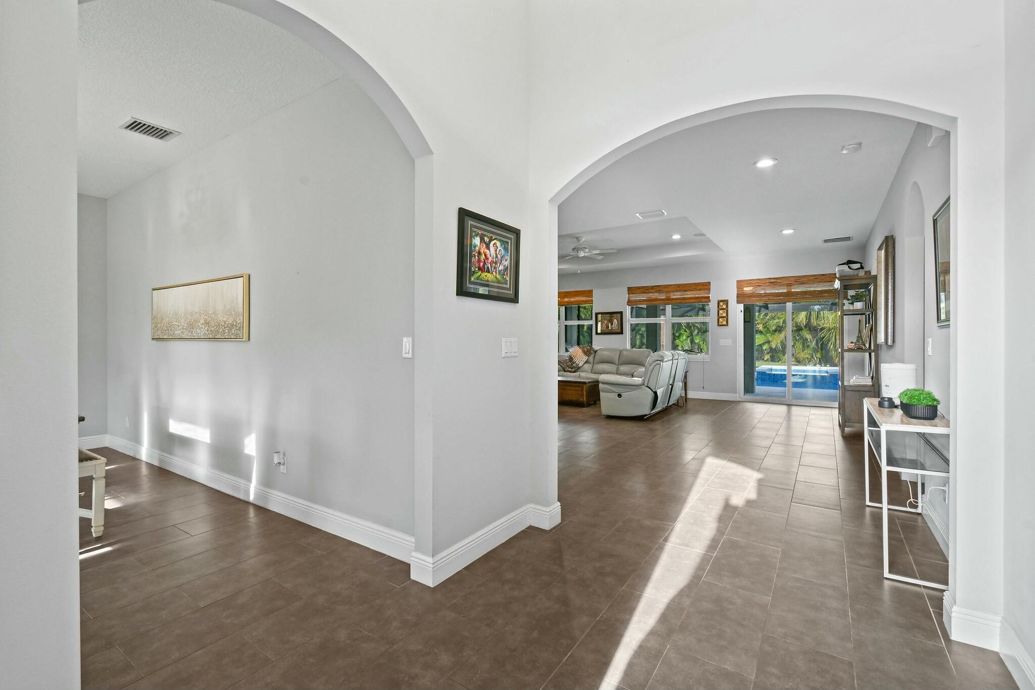 3214 Southwest Constellation Road Port St. Lucie, FL 34953 - Photo 6 of 50 Foyer