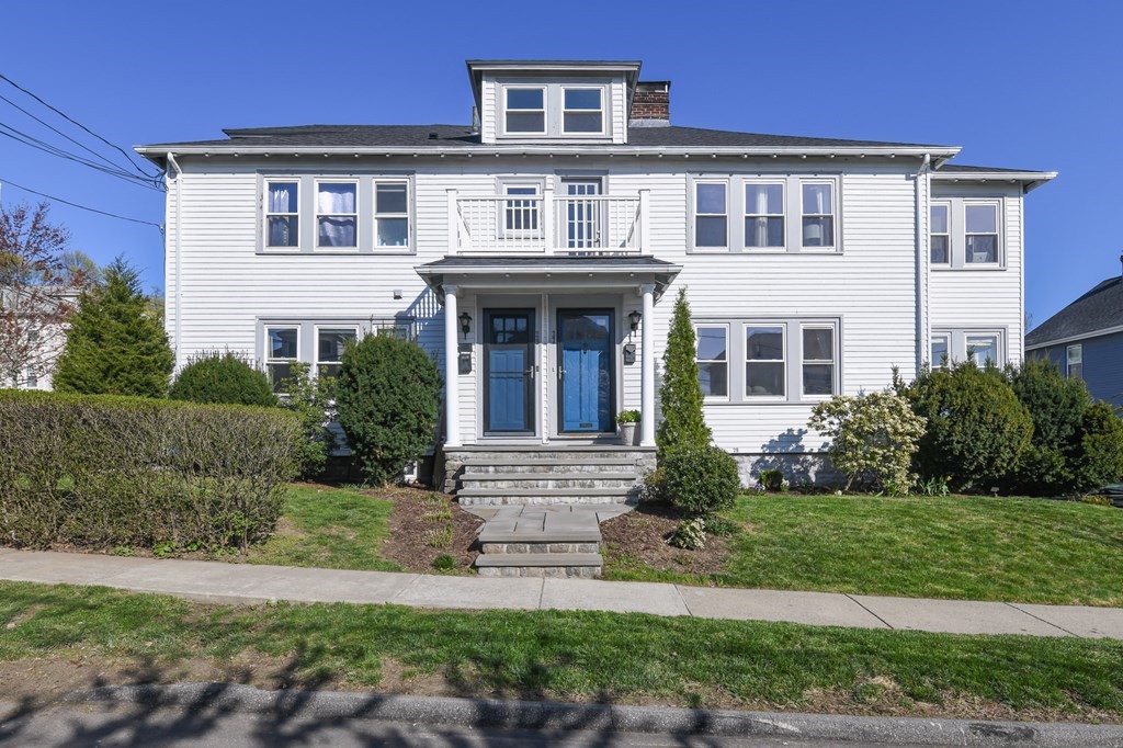 27 Fuller Road, Unit 27 Watertown, MA 02472 - Photo 1 of 13 a front view of a house with garden