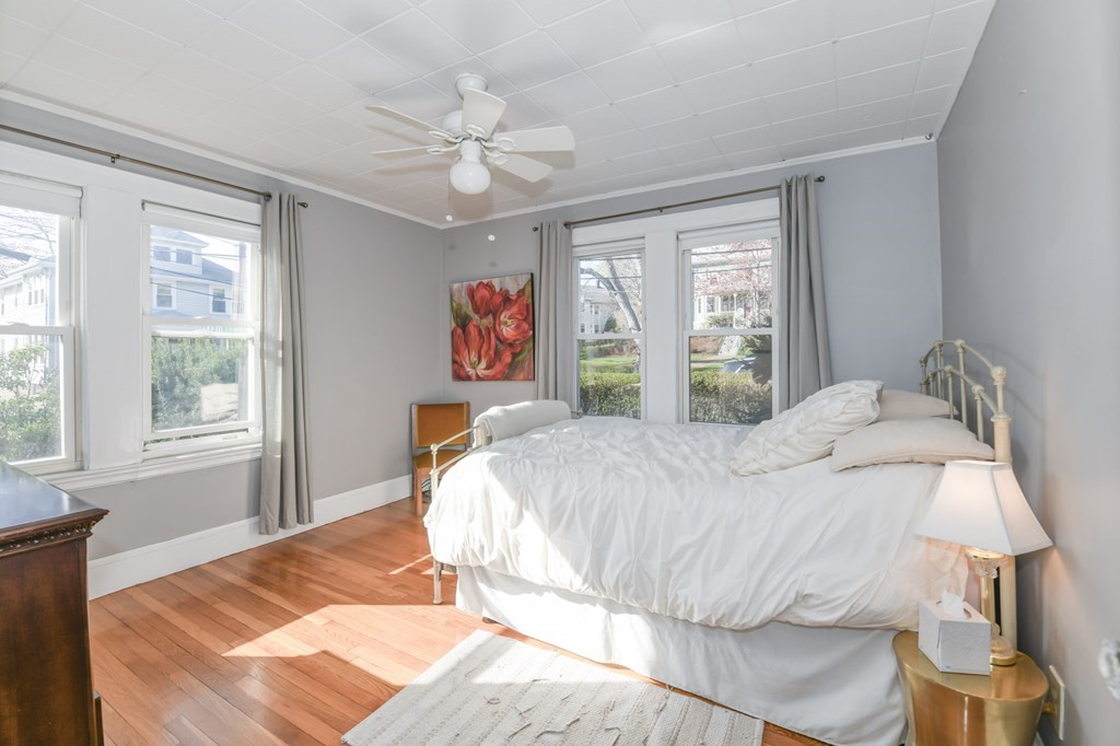 27 Fuller Road, Unit 27 Watertown, MA 02472 - Photo 10 of 13 a bed sitting in a bedroom next to a window