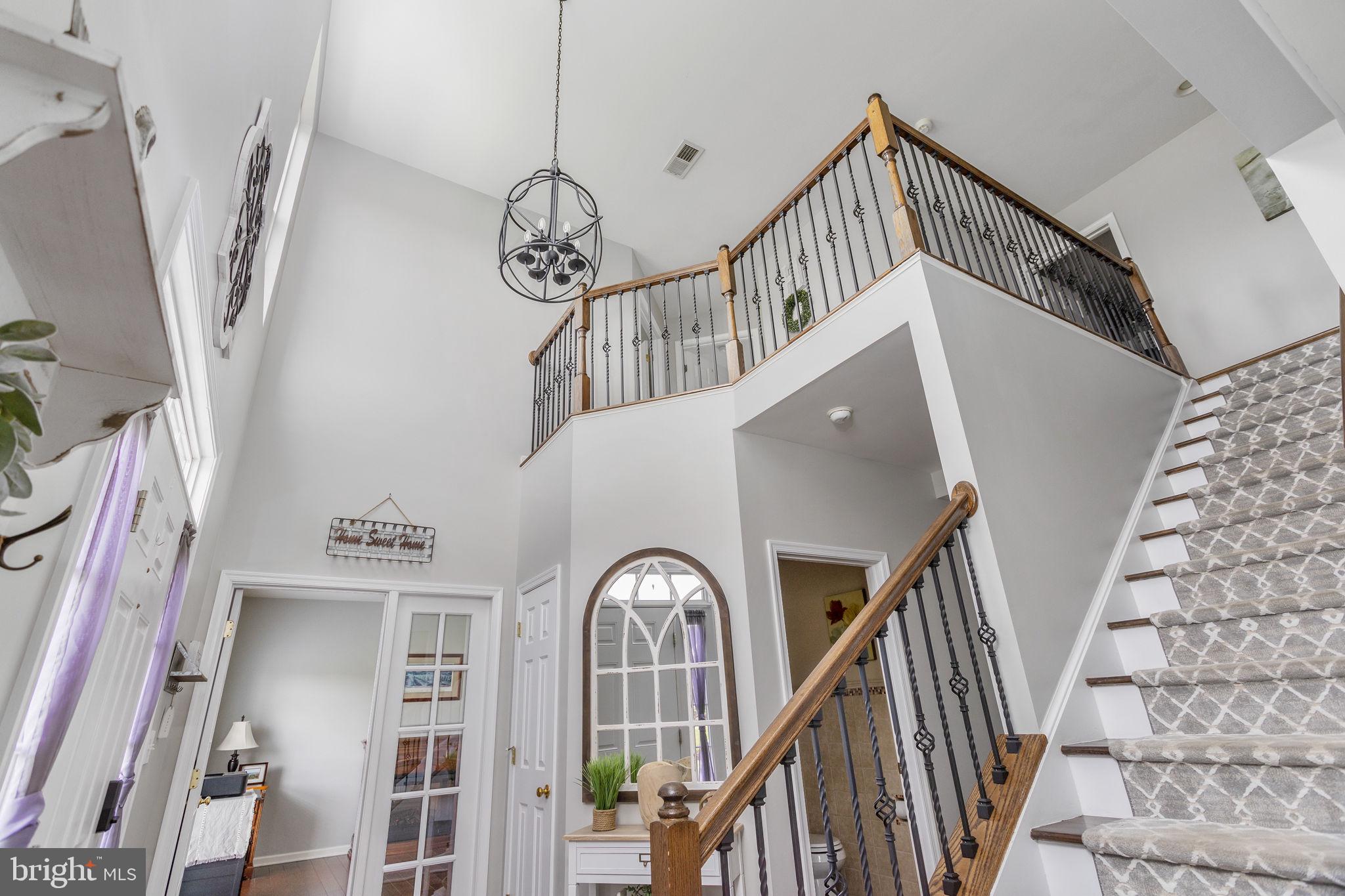 11 Nicholas Court Cream Ridge, NJ 08514 - Photo 12 of 67 Elegant foyer with sweeping staircase.