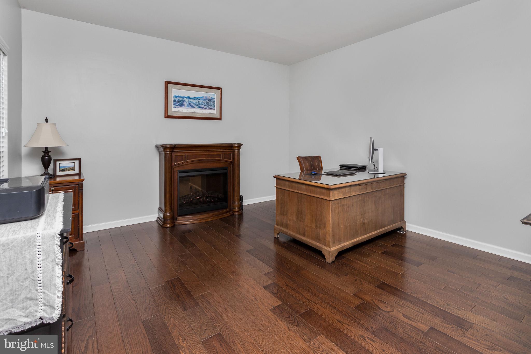 11 Nicholas Court Cream Ridge, NJ 08514 - Photo 24 of 67 Elegant workspace with warm tones.