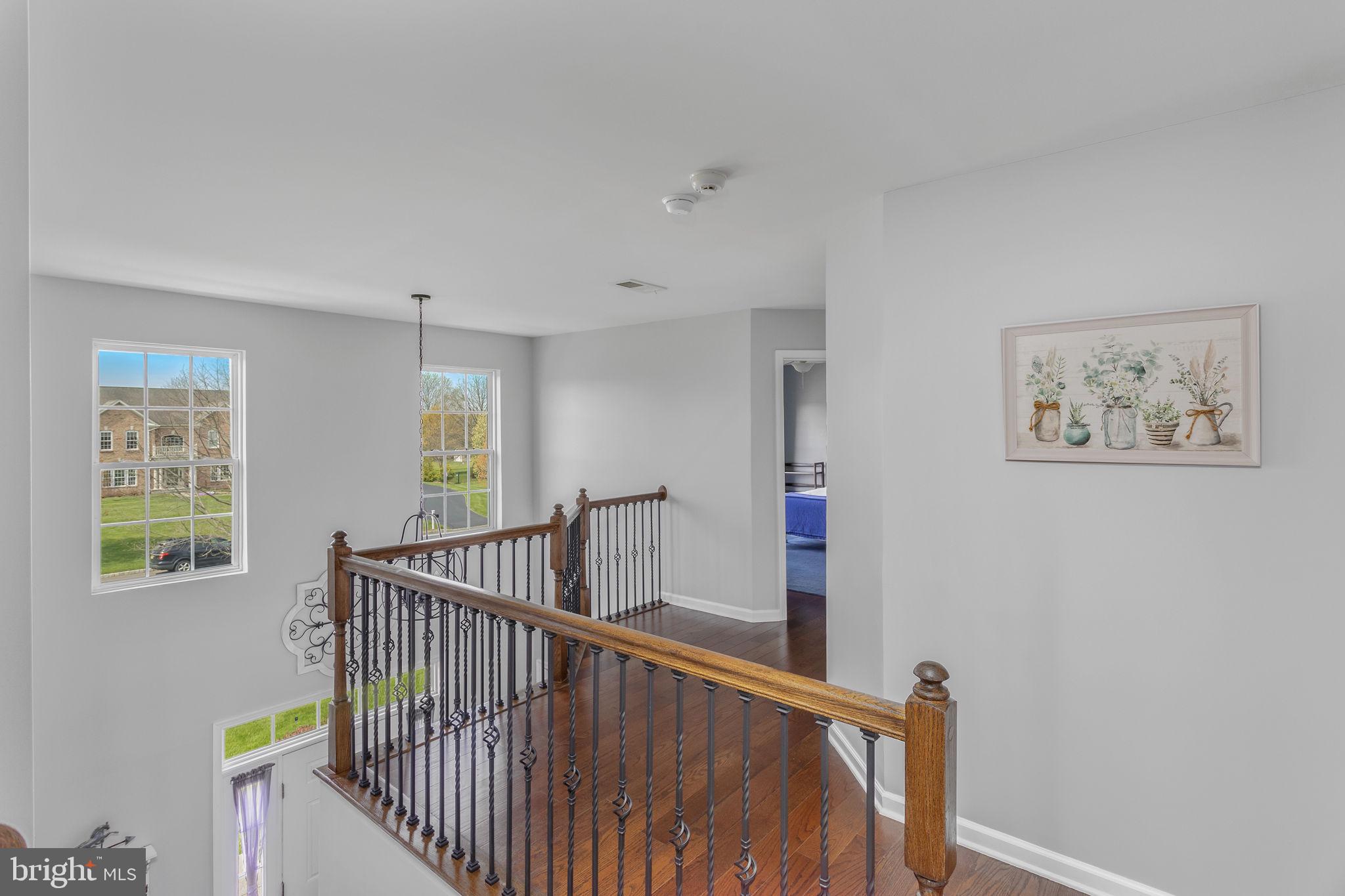 11 Nicholas Court Cream Ridge, NJ 08514 - Photo 29 of 67 Bright and airy second-floor landing.