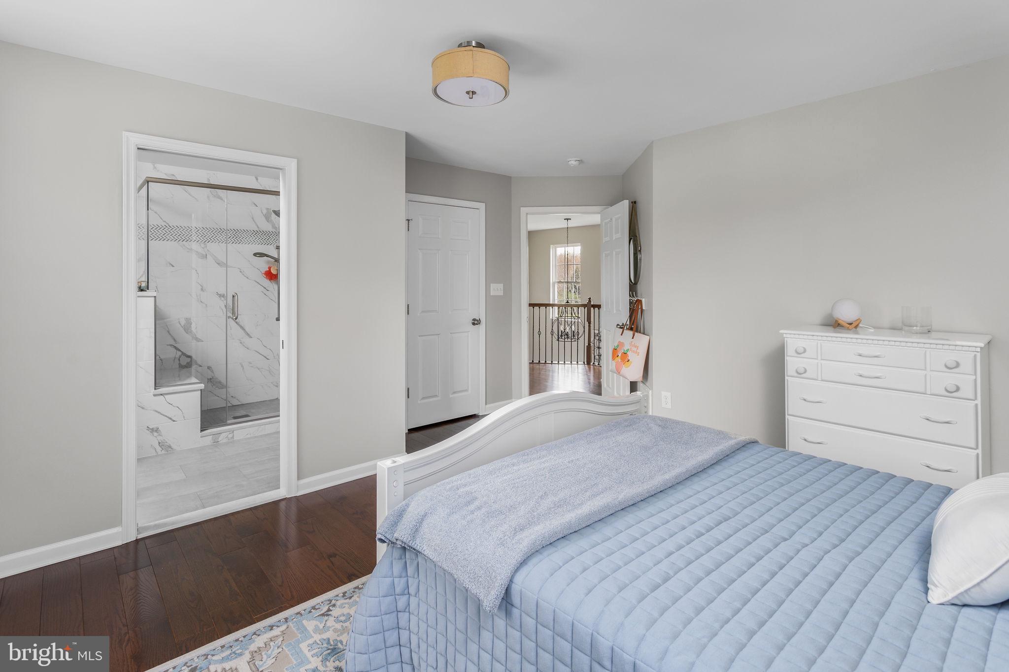 11 Nicholas Court Cream Ridge, NJ 08514 - Photo 36 of 67 Serene bedroom with modern elegance.