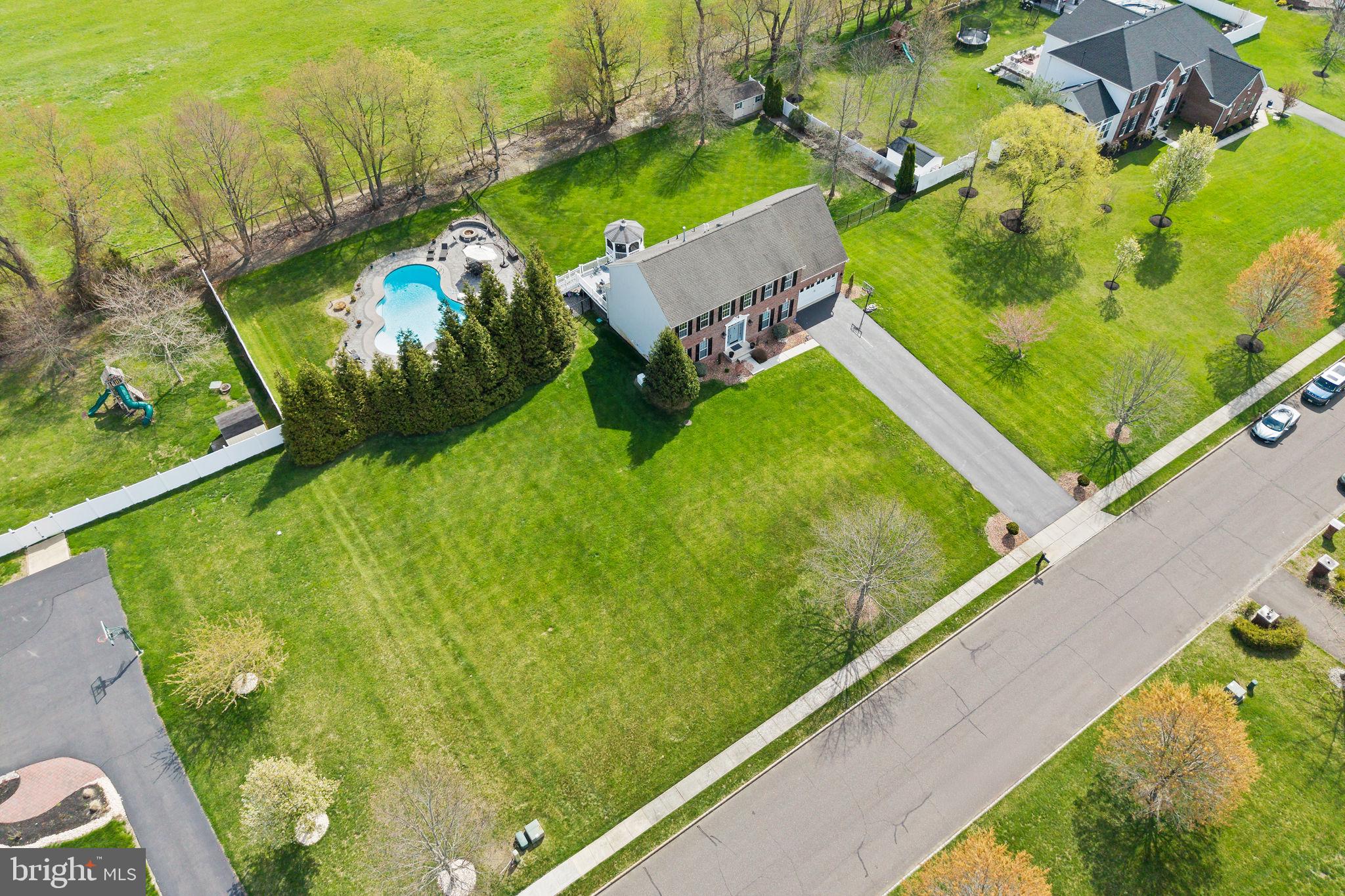 11 Nicholas Court Cream Ridge, NJ 08514 - Photo 5 of 67 Sprawling estate with lush greenery.