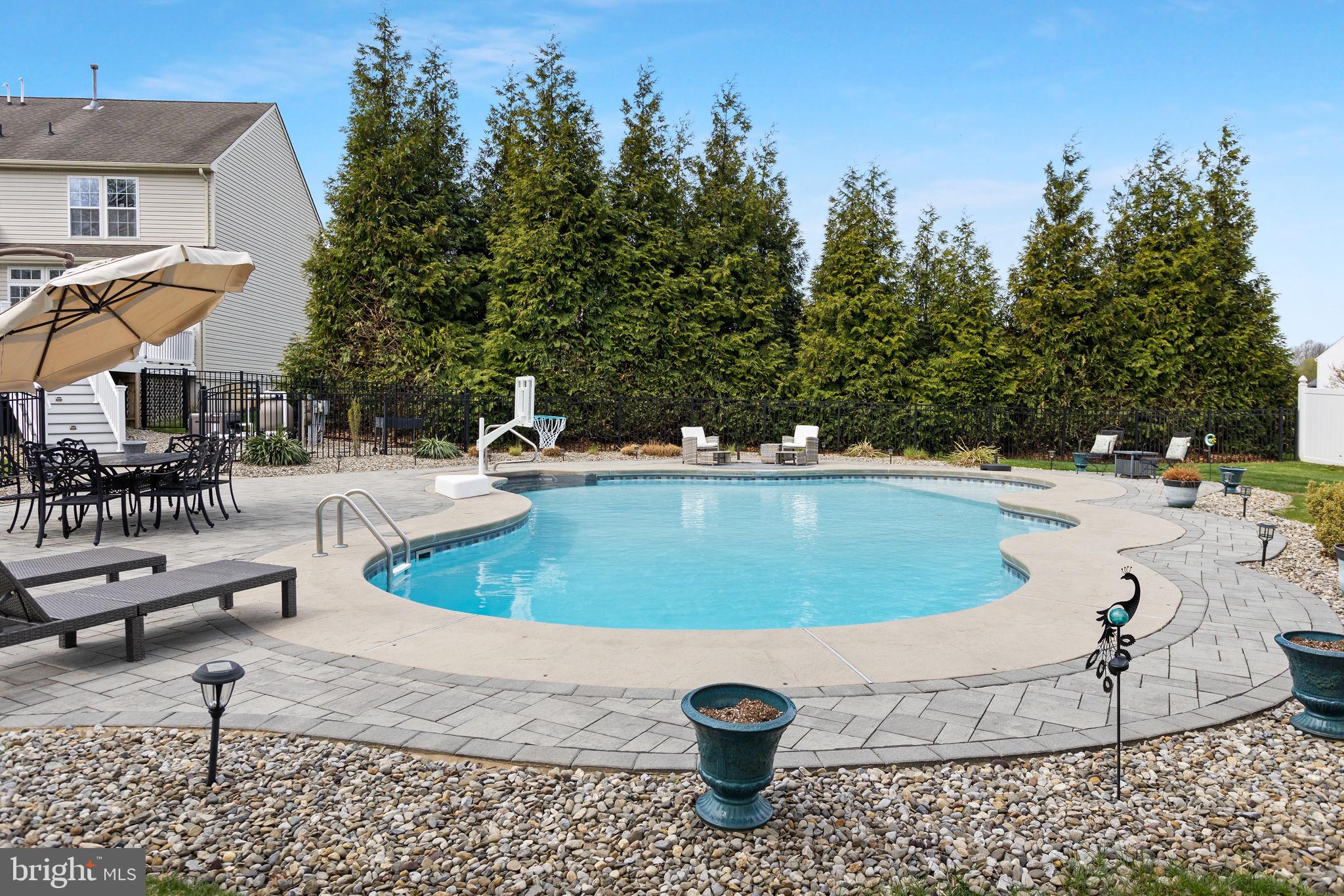 11 Nicholas Court Cream Ridge, NJ 08514 - Photo 58 of 67 Serene backyard oasis with pool.