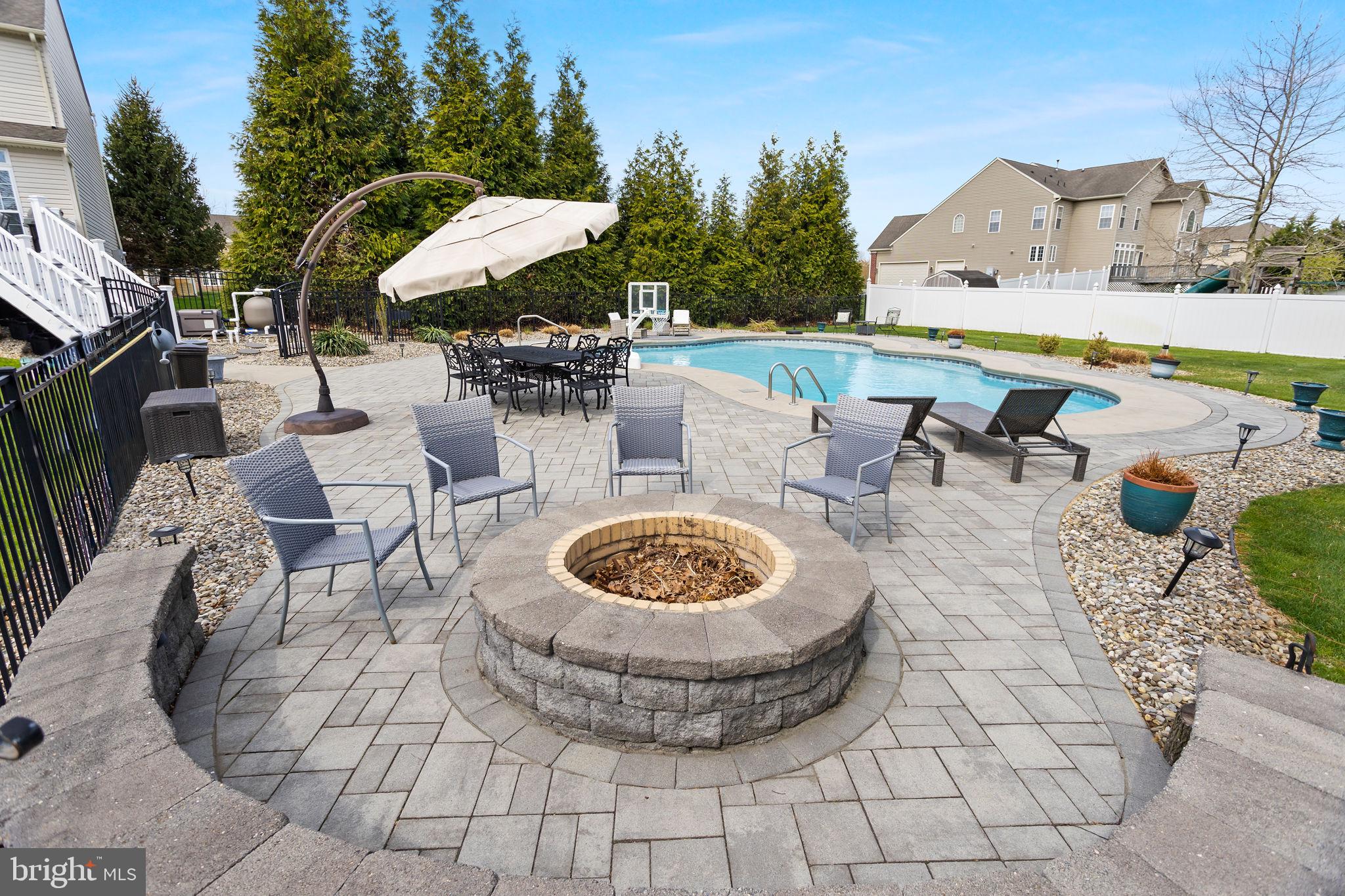 11 Nicholas Court Cream Ridge, NJ 08514 - Photo 59 of 67 Inviting outdoor oasis with poolside charm.