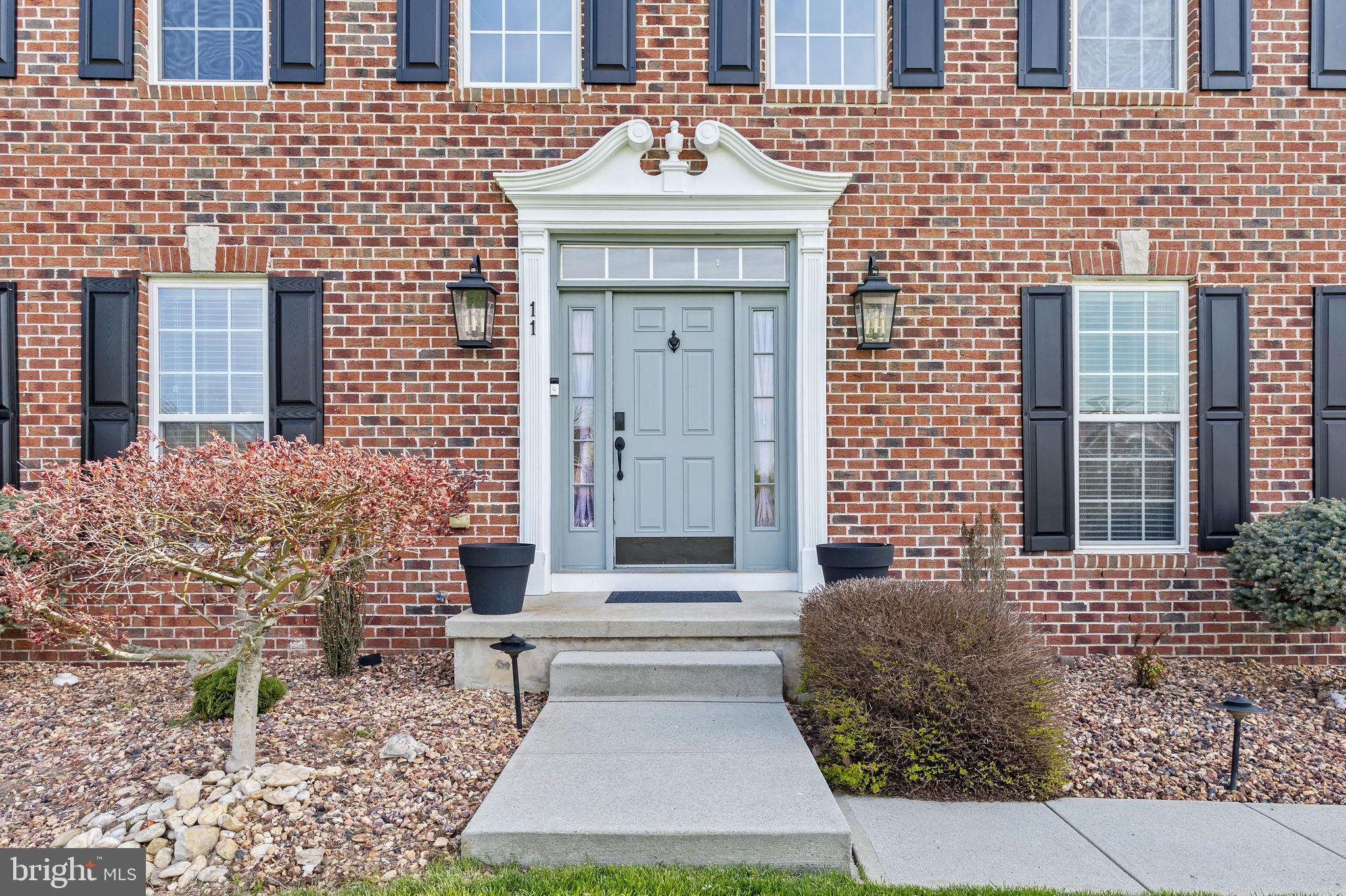 11 Nicholas Court Cream Ridge, NJ 08514 - Photo 8 of 67 Charming brick facade with inviting entry.