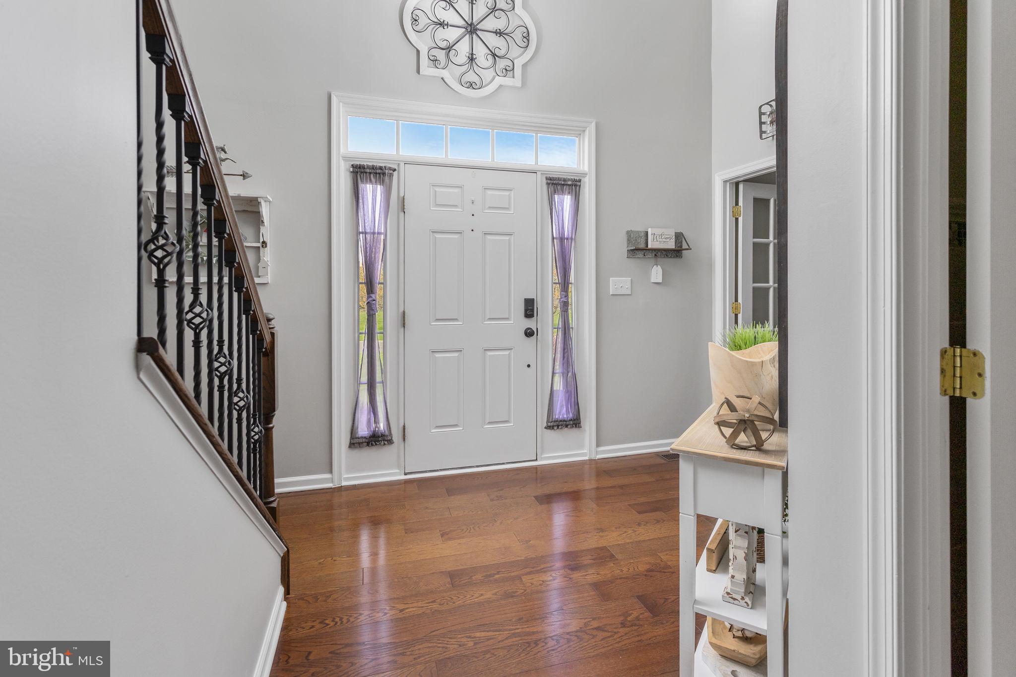 11 Nicholas Court Cream Ridge, NJ 08514 - Photo 9 of 67 Inviting entryway with warm tones.