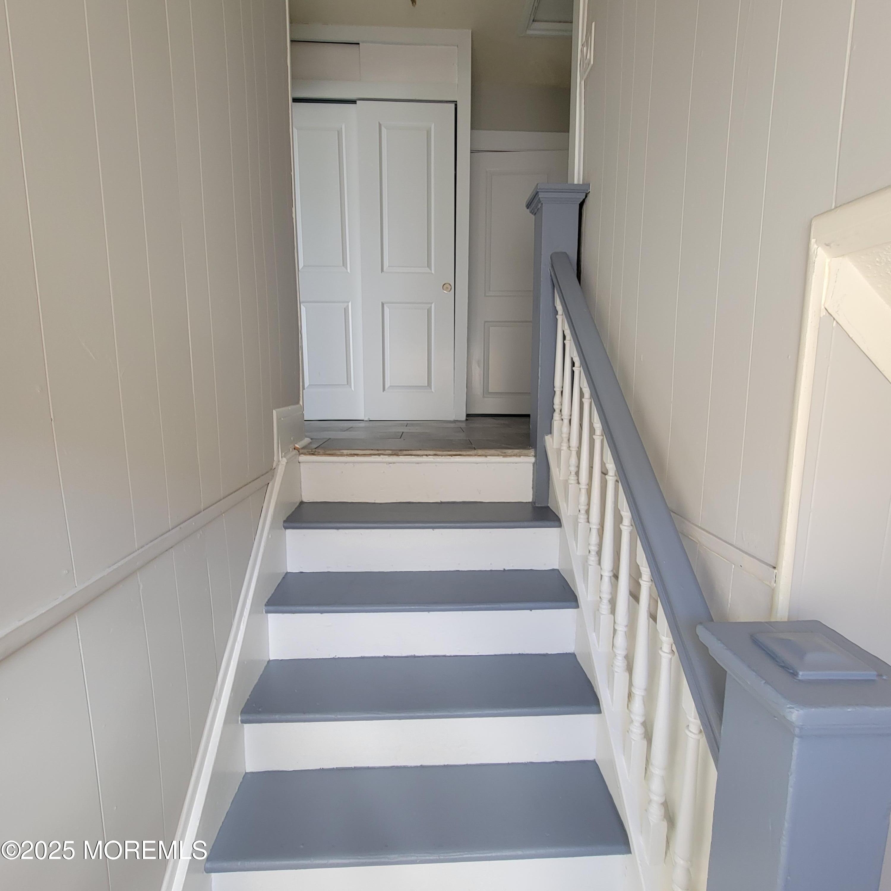 100 3rd Street Keyport, NJ 07735 - Photo 4 of 14 a view of staircase with white walls and a rug