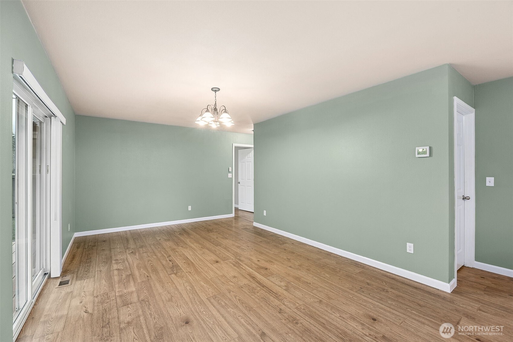 101 Murphy Lane South Rainier, WA 98576 - Photo 11 of 40 wooden floor in an empty room with a window