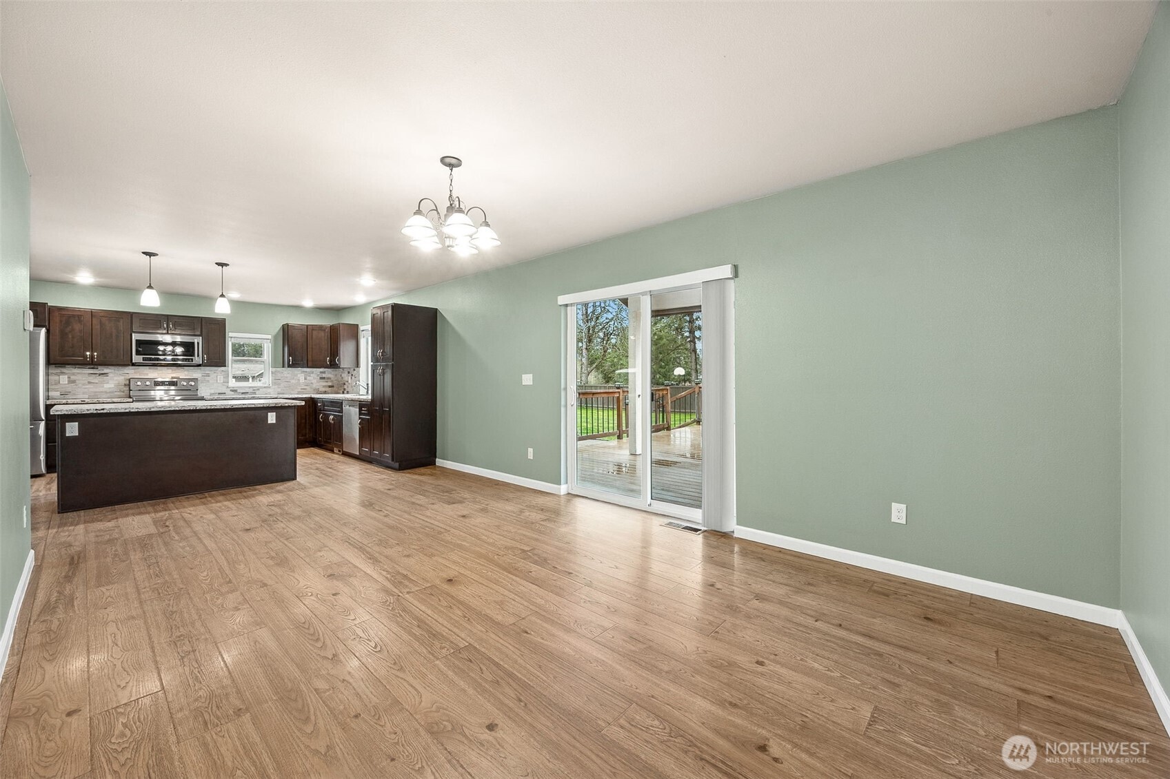 101 Murphy Lane South Rainier, WA 98576 - Photo 12 of 40 a view of kitchen with wooden floor and a kitchen
