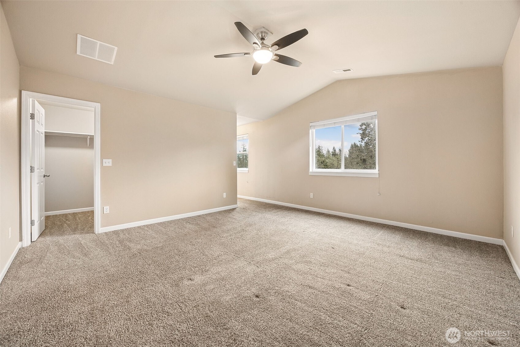 101 Murphy Lane South Rainier, WA 98576 - Photo 16 of 40 an empty room with windows and fan