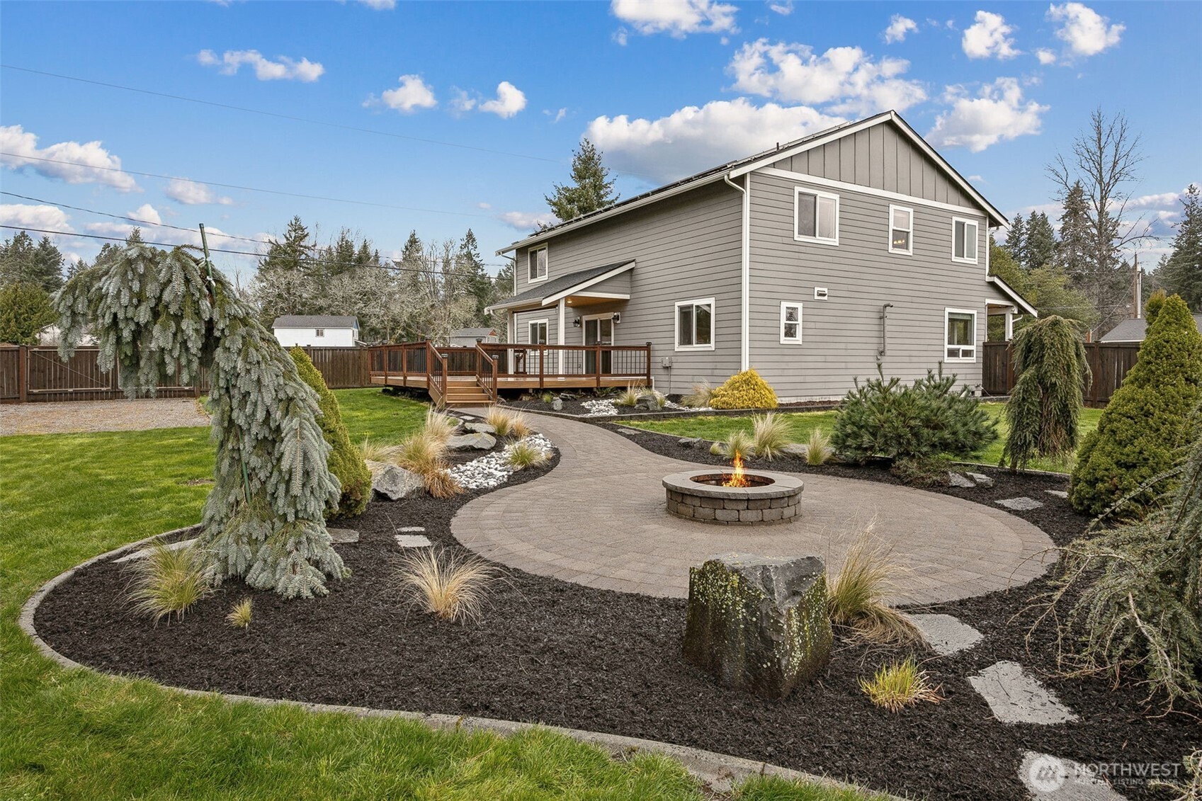 101 Murphy Lane South Rainier, WA 98576 - Photo 36 of 40 a view of a house with backyard porch and sitting area