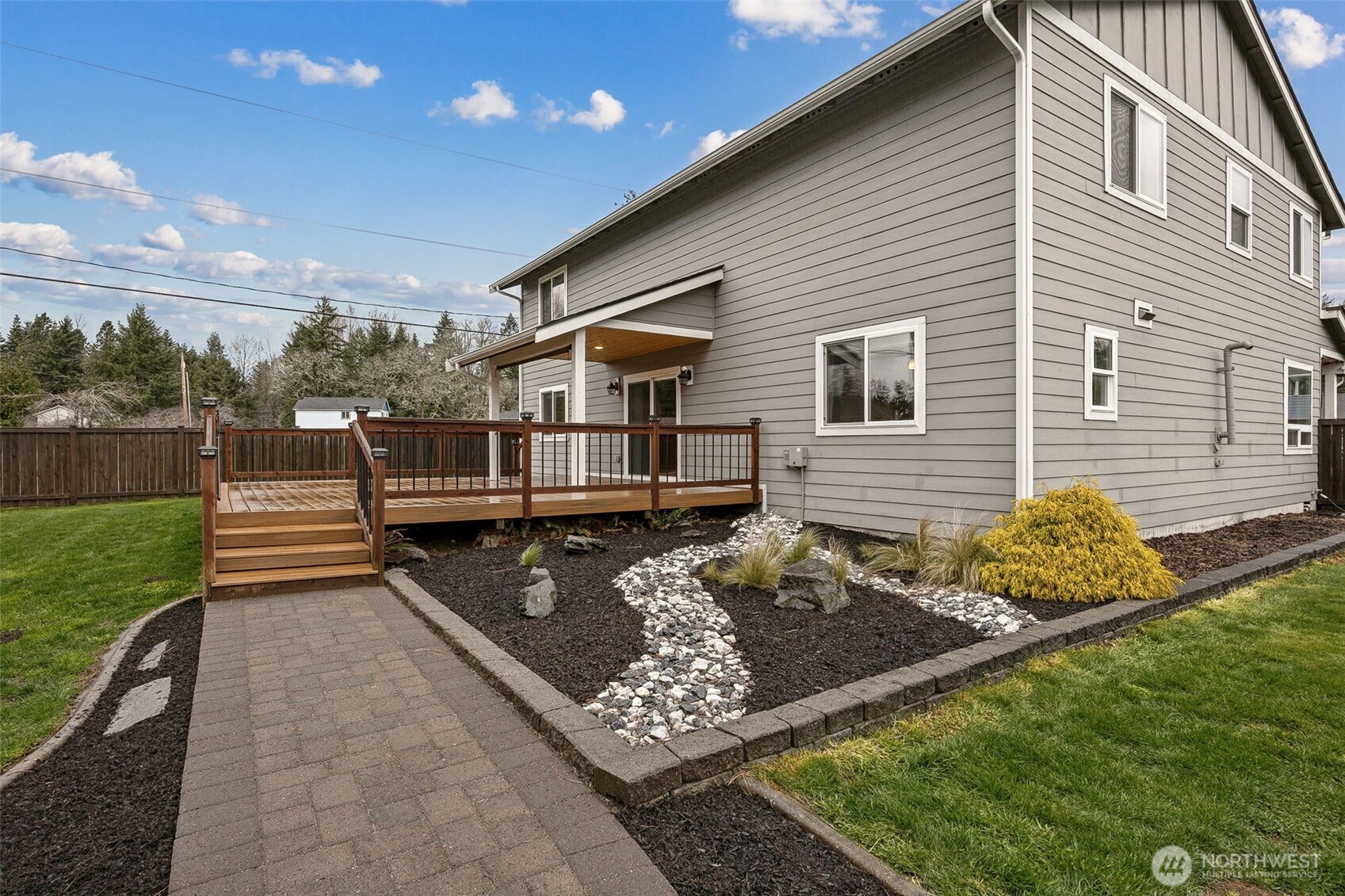 101 Murphy Lane South Rainier, WA 98576 - Photo 38 of 40 a view of a house with backyard and sitting area