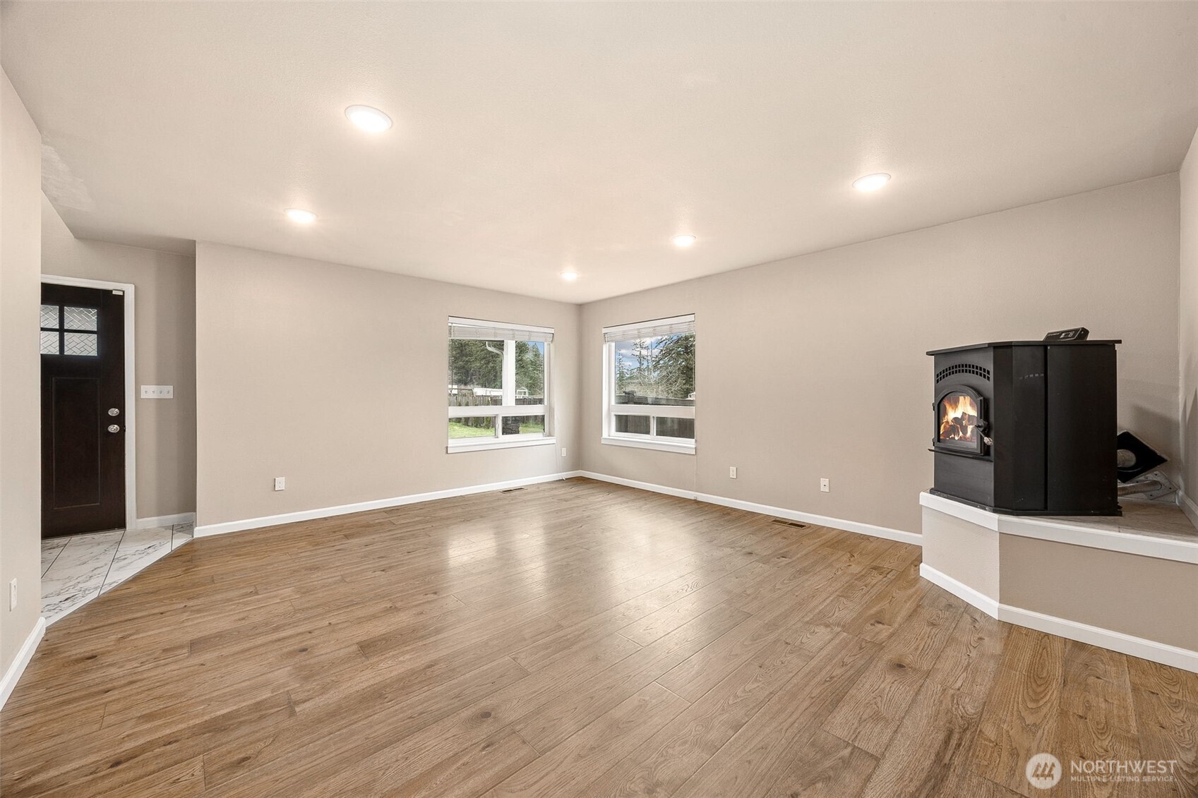 101 Murphy Lane South Rainier, WA 98576 - Photo 6 of 40 a view of an empty room with wooden floor and a window