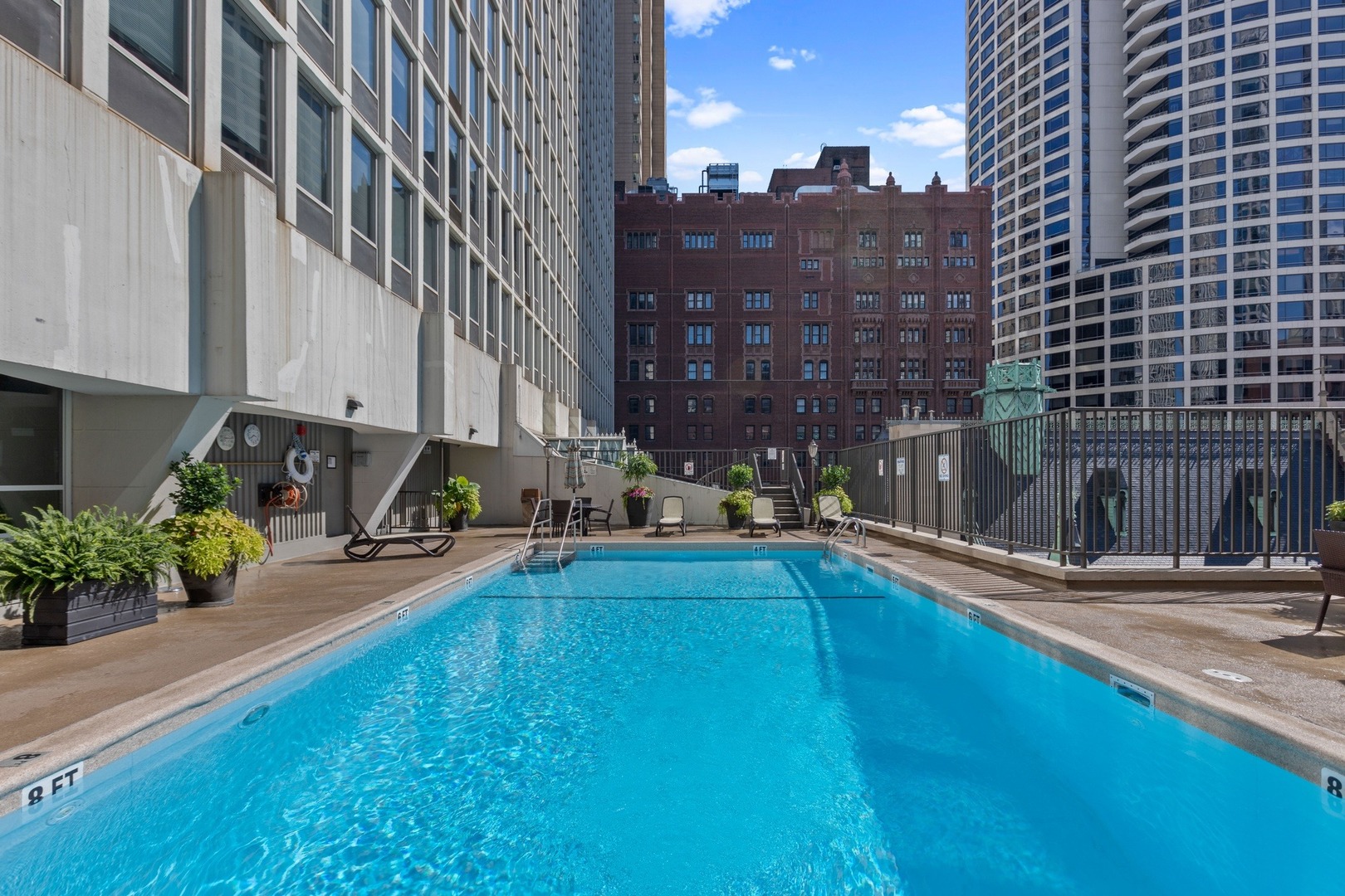 111 East Chestnut Street, Unit 25K Chicago, IL 60611 - Photo 21 of 28 a swimming pool with outdoor seating and yard