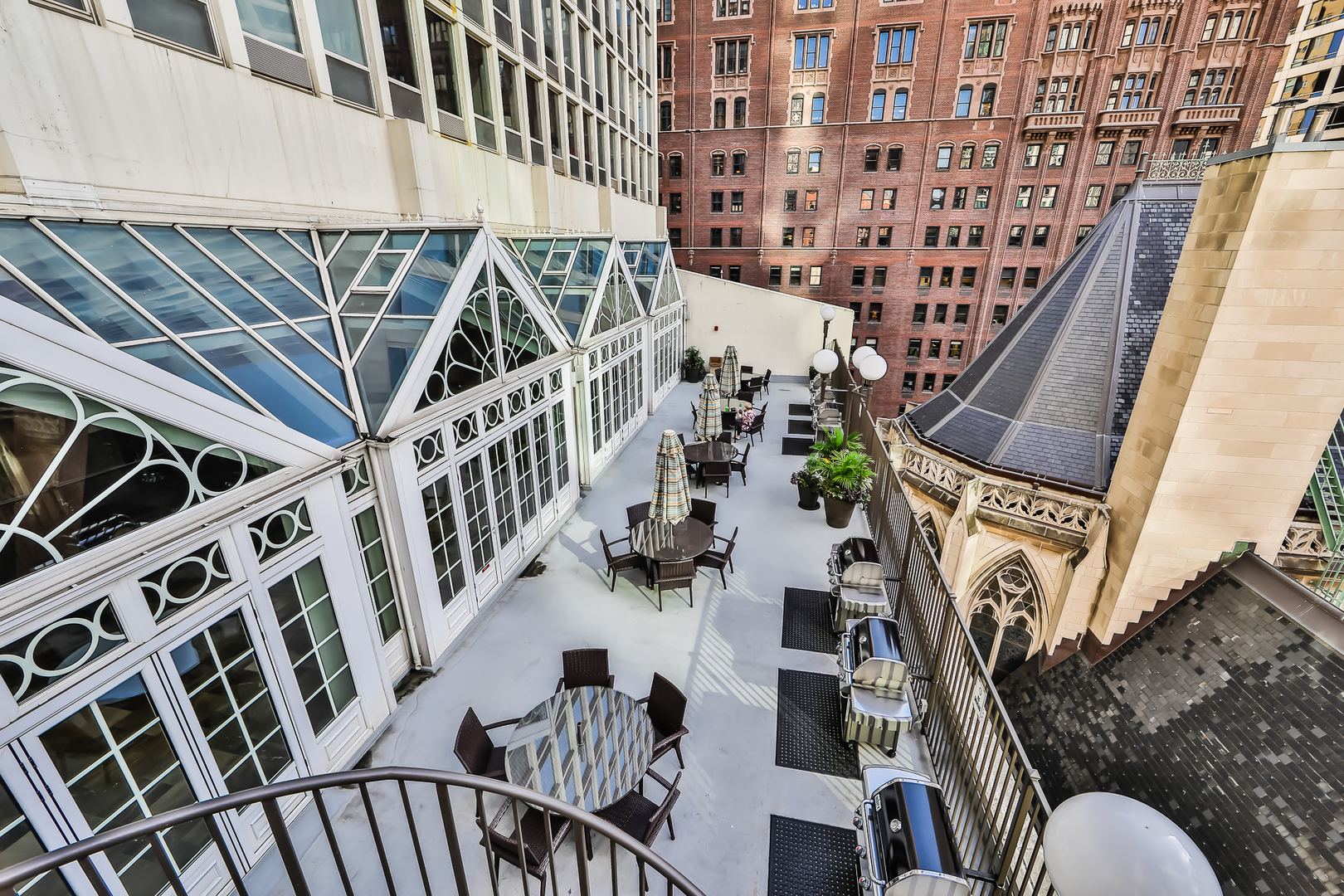 111 East Chestnut Street, Unit 25K Chicago, IL 60611 - Photo 24 of 28 a view of stairs and hall with wooden floor