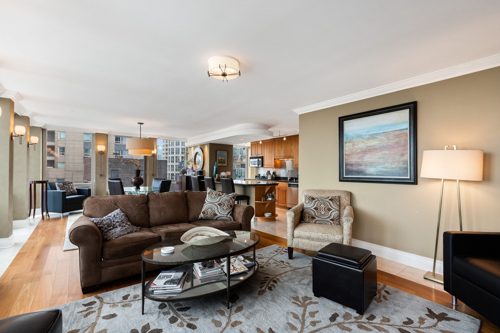 111 East Chestnut Street, Unit 25K Chicago, IL 60611 - Photo 6 of 28 a living room with furniture and a flat screen tv