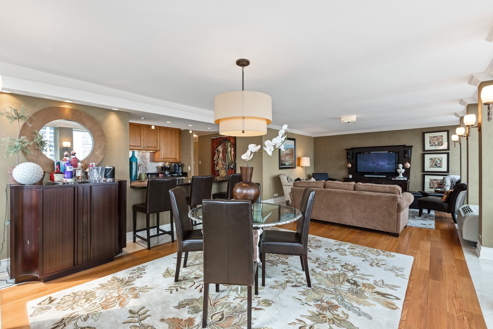 111 East Chestnut Street, Unit 25K Chicago, IL 60611 - Photo 8 of 28 a living room with furniture and wooden floor