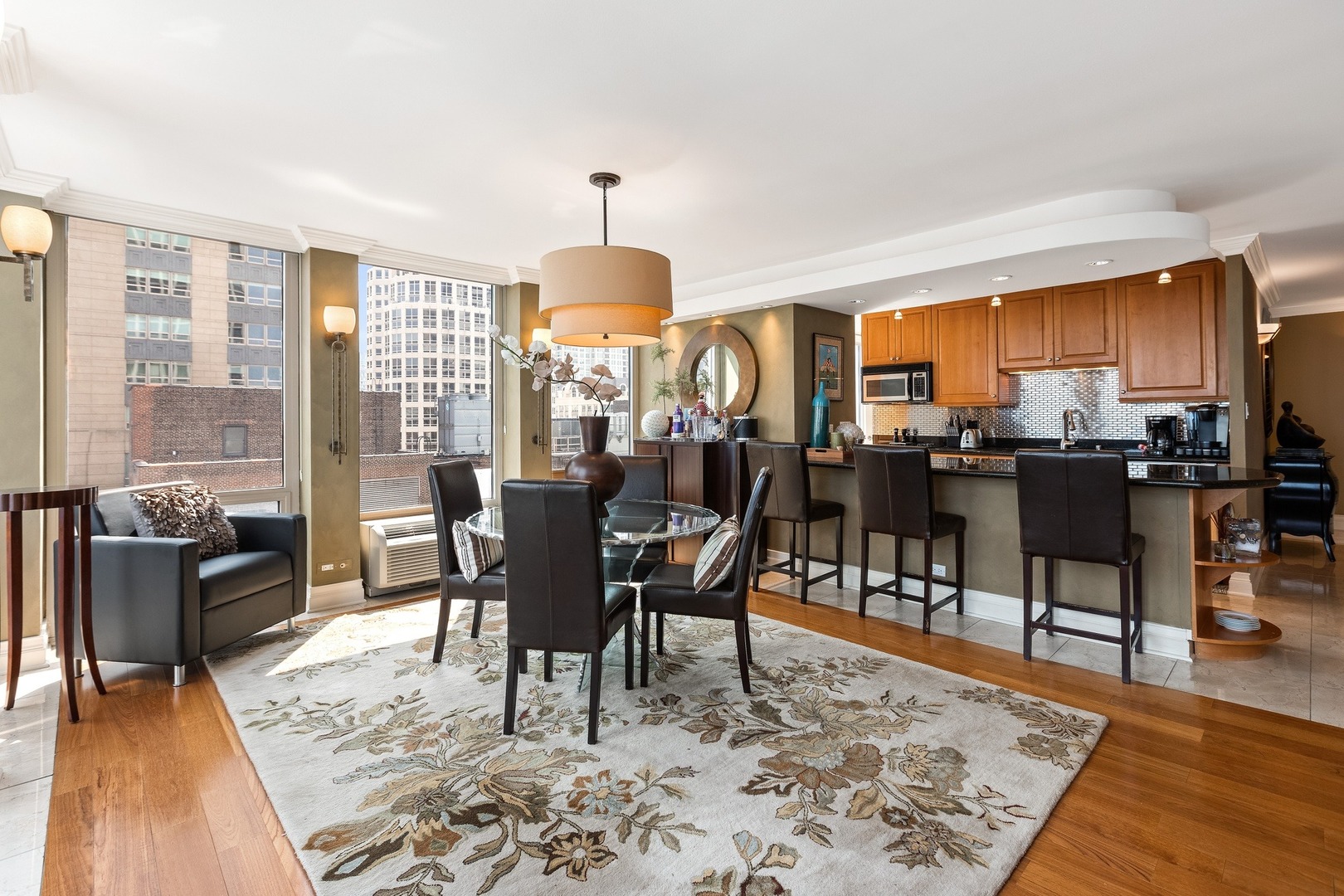 111 East Chestnut Street, Unit 25K Chicago, IL 60611 - Photo 9 of 28 a view of a dining room with furniture