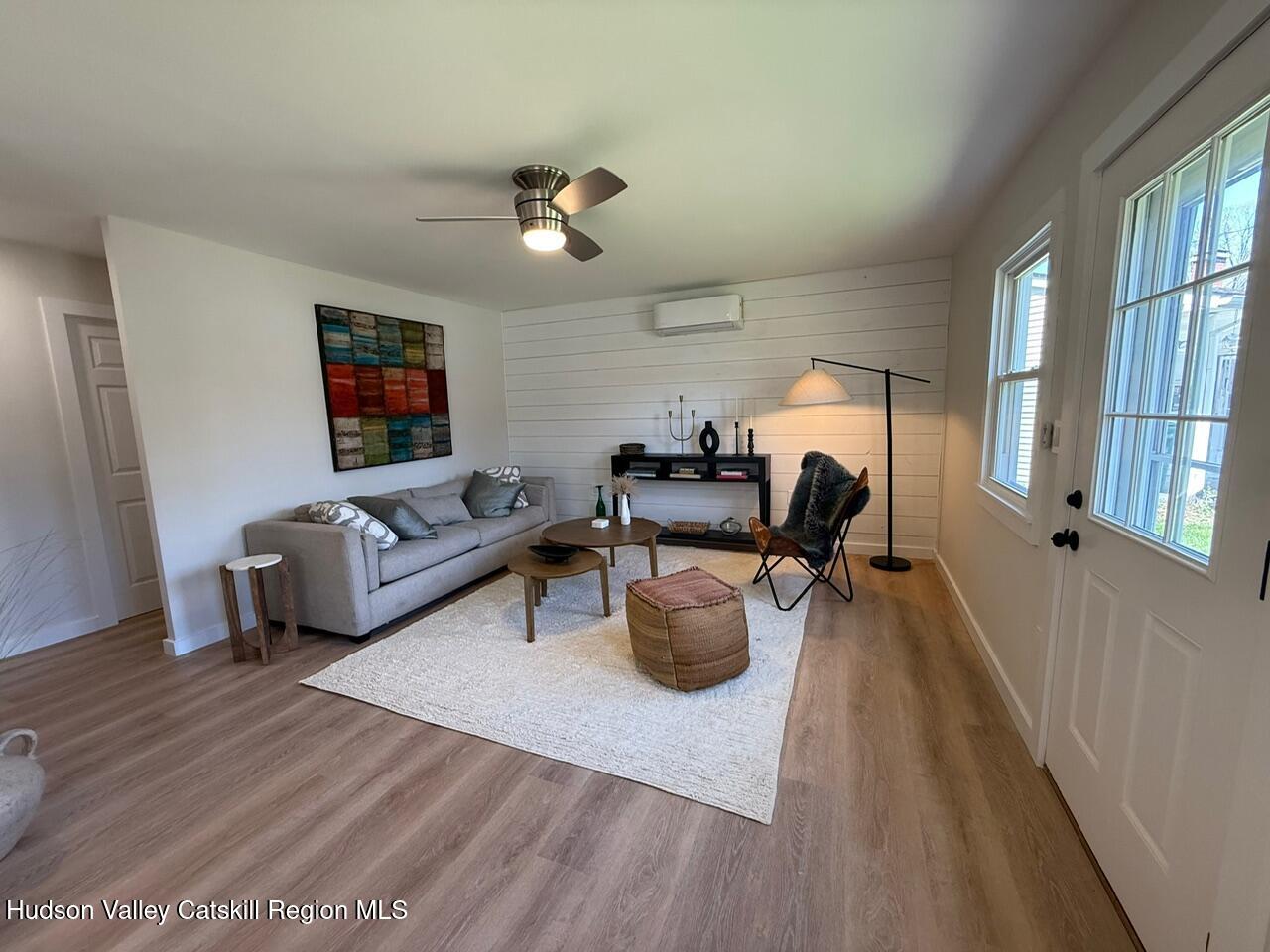 7 Park Circle High Falls, NY 12440 - Photo 12 of 31 a living room with furniture and a flat screen tv